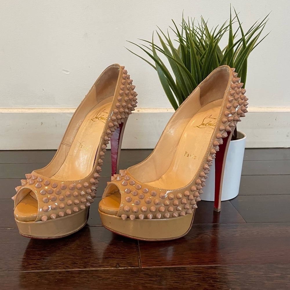 CHRISTIAN LOUBOUTIN NUDE SPIKED HEELS Size 37 .
